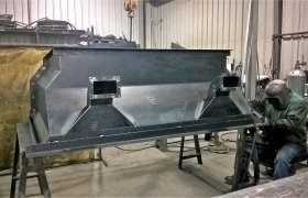 Metal chute fabricated by Leet Industries